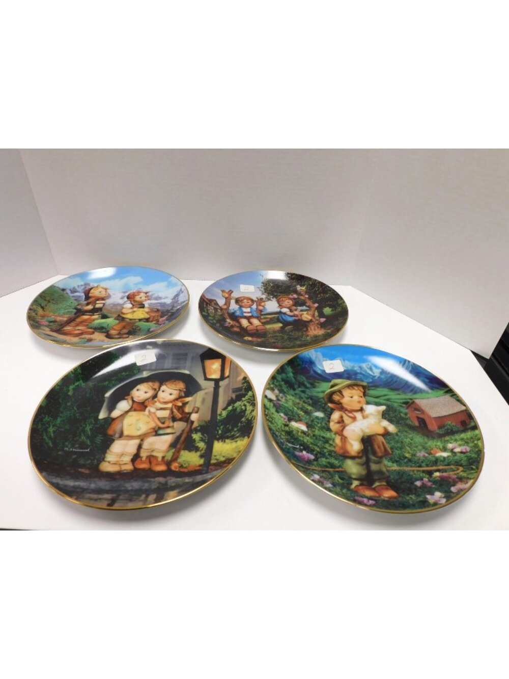 Set of 4 MJ Hummel Plates Gentle Friends, Stormy Weather, Apple Tree & Little Ex